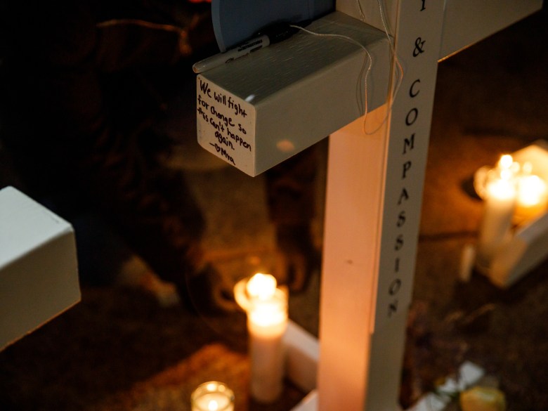A cross and lighted candles